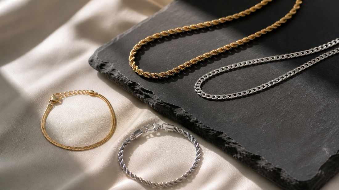 Gold and silver chains and bracelets styled together