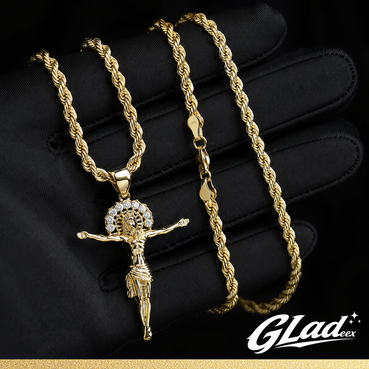 14K gold plated Jesus pendant with two rope chain widths on black fabric