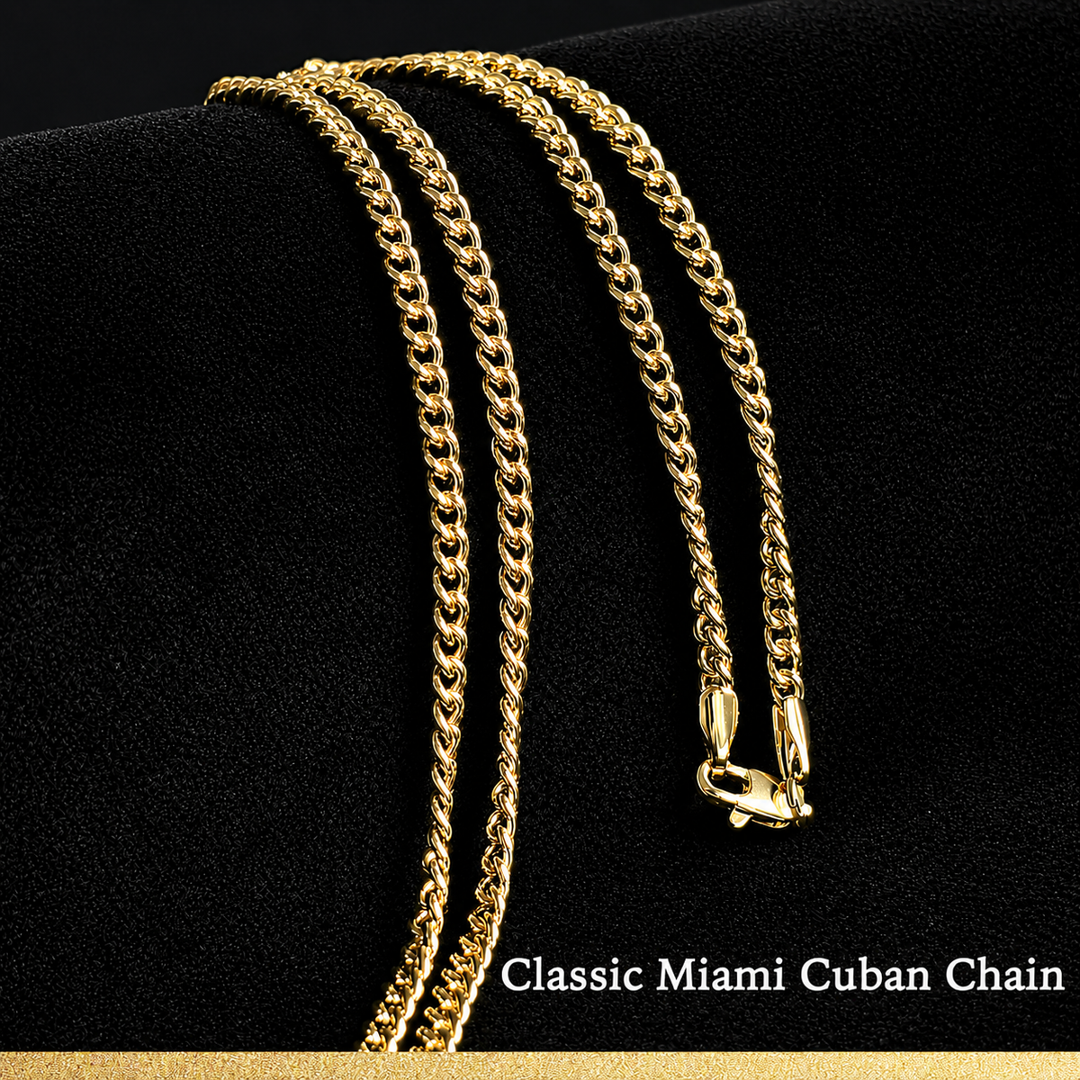 Classic 14K gold plated Miami Cuban link chain displayed on black