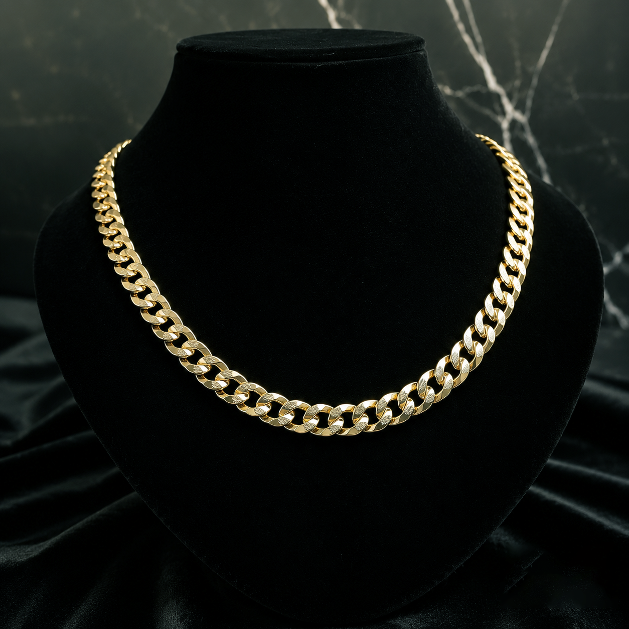 8mm 14K gold plated Cuban link chain displayed on a black necklace stand